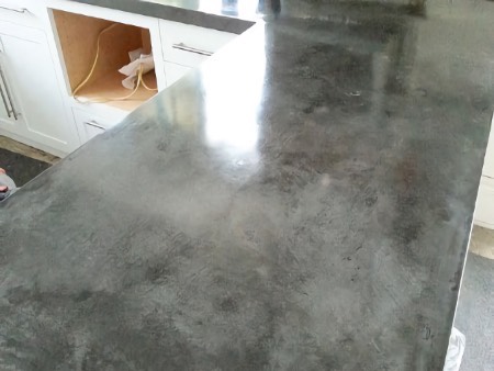 Grind, polish, and seal concrete counter tops.