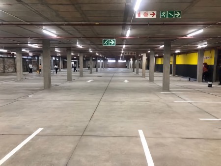 Shopping parking garage cleanup and surface hardener: After.