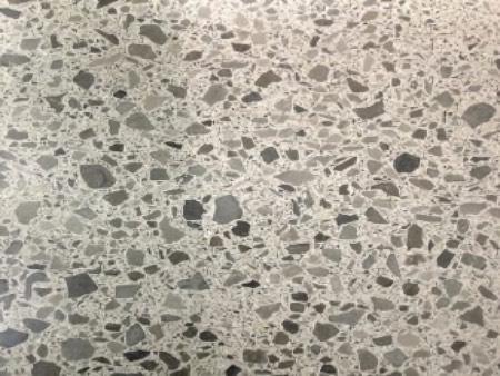 Mainly 6 to 9 mm aggregate, with paste and fines in between.