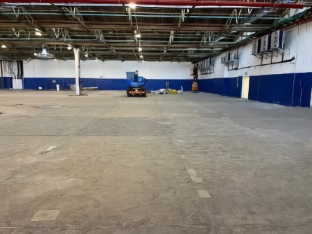 Warehouse renovation, smooth, hardener, and seal: Before.